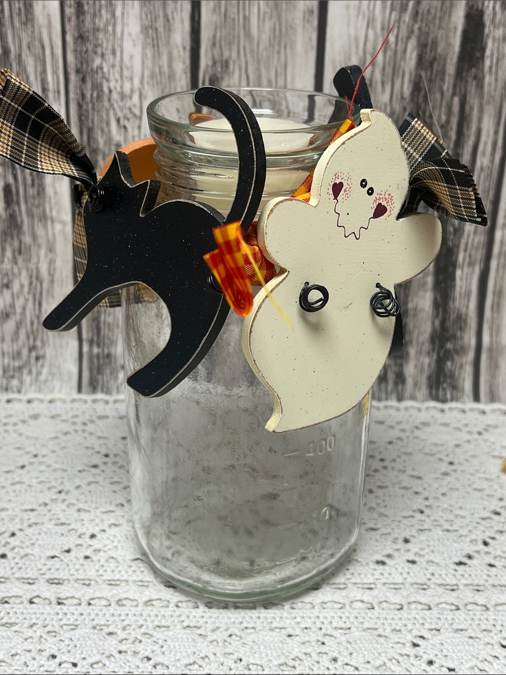 Seasonal Mason jar votive holder with 5 changeable decorative wooden ornaments